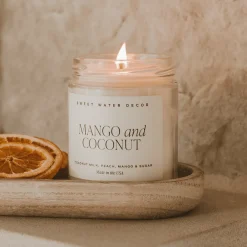 Sweet Water Decor Candles|9 Oz Clear Jars>Mango and Coconut - 9 oz